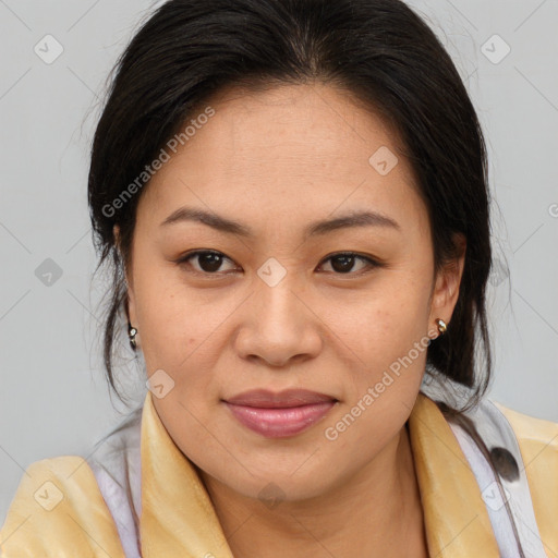 Joyful asian young-adult female with medium  brown hair and brown eyes