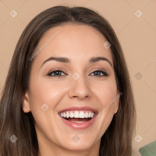 Joyful white young-adult female with long  brown hair and brown eyes