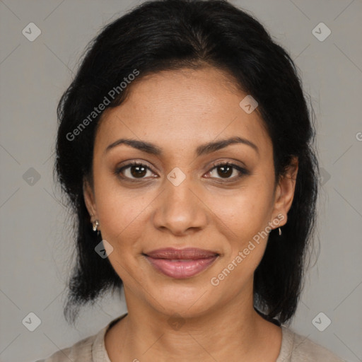 Joyful latino young-adult female with medium  brown hair and brown eyes