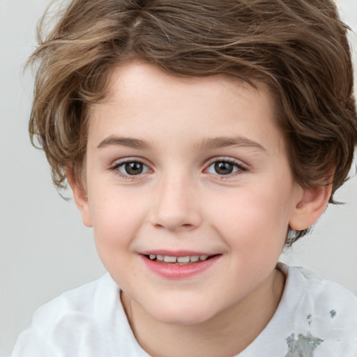 Joyful white child female with short  brown hair and brown eyes