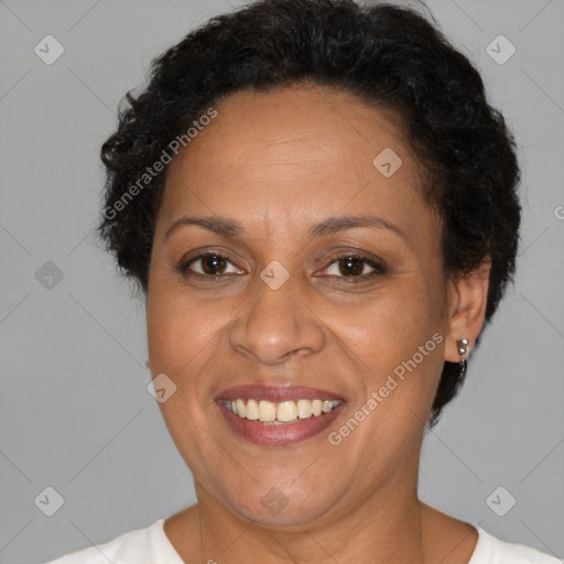 Joyful latino adult female with short  brown hair and brown eyes