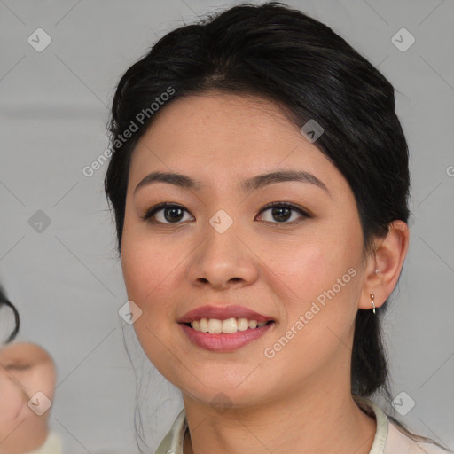 Joyful asian young-adult female with medium  brown hair and brown eyes