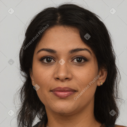 Joyful latino young-adult female with long  brown hair and brown eyes