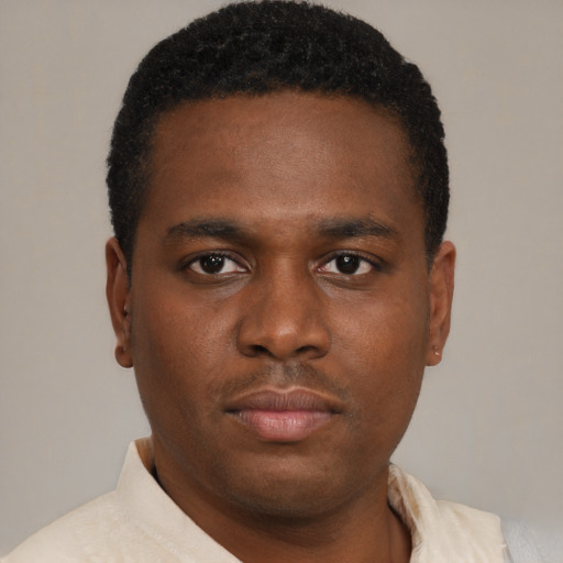 Neutral black young-adult male with short  brown hair and brown eyes