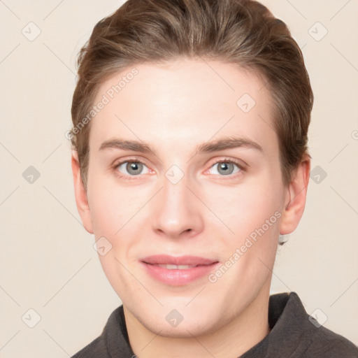 Joyful white young-adult female with short  brown hair and grey eyes