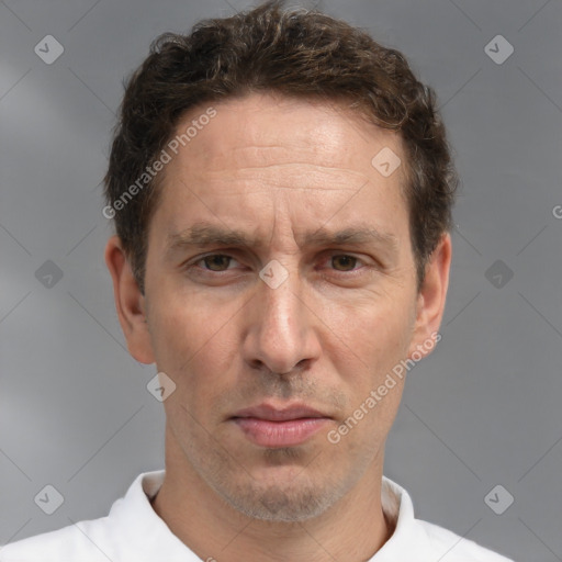 Neutral white adult male with short  brown hair and brown eyes