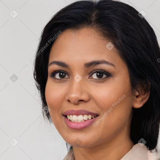 Joyful latino young-adult female with medium  black hair and brown eyes