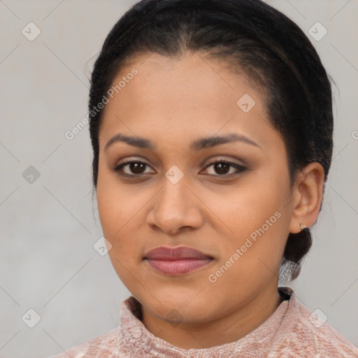 Joyful latino young-adult female with short  brown hair and brown eyes