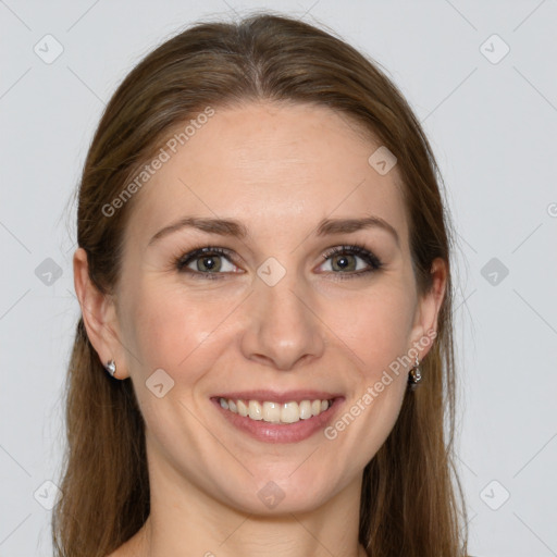 Joyful white young-adult female with long  brown hair and grey eyes