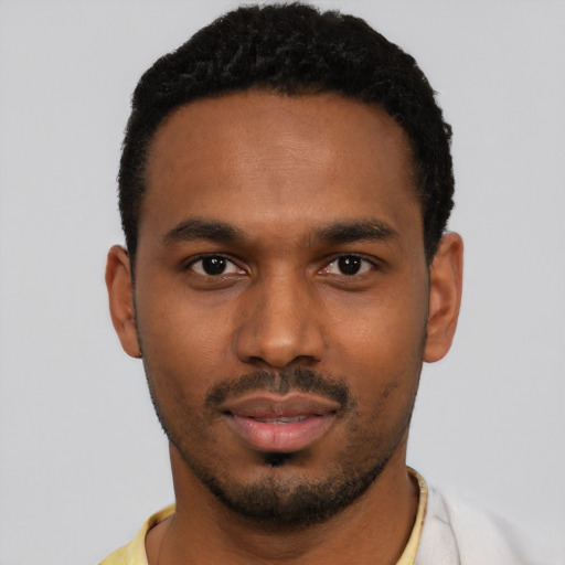 Neutral black young-adult male with short  black hair and brown eyes