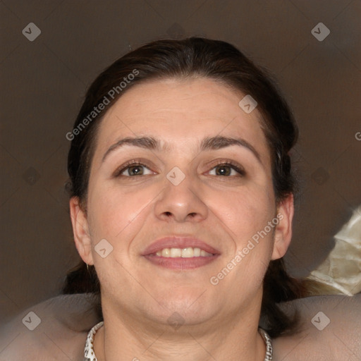 Joyful white adult female with medium  brown hair and brown eyes