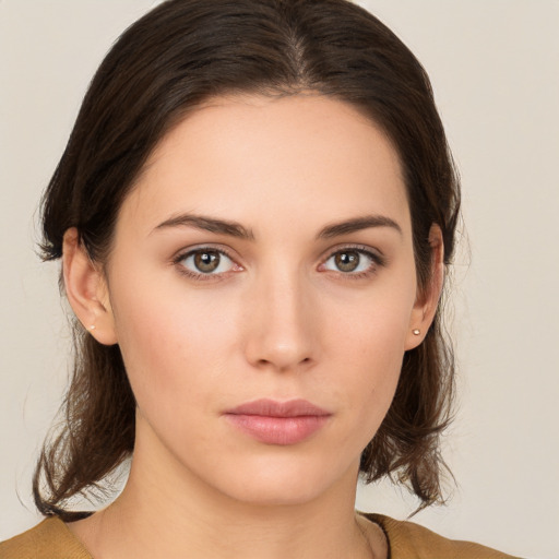 Neutral white young-adult female with medium  brown hair and brown eyes