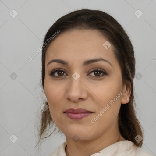 Joyful white young-adult female with medium  brown hair and brown eyes