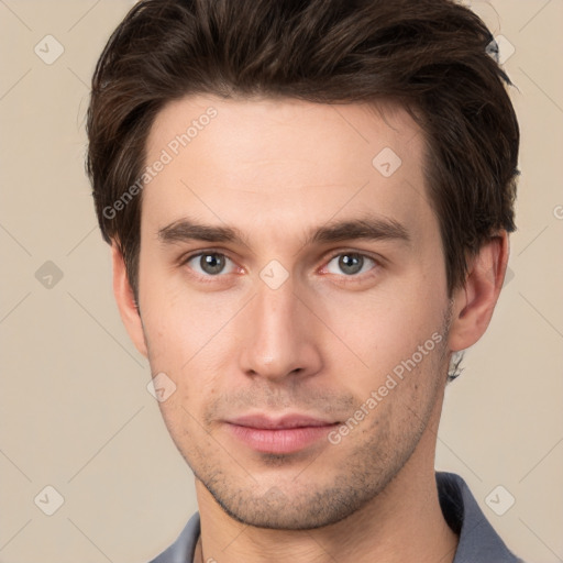 Neutral white young-adult male with short  brown hair and brown eyes