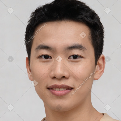 Joyful asian young-adult male with short  black hair and brown eyes