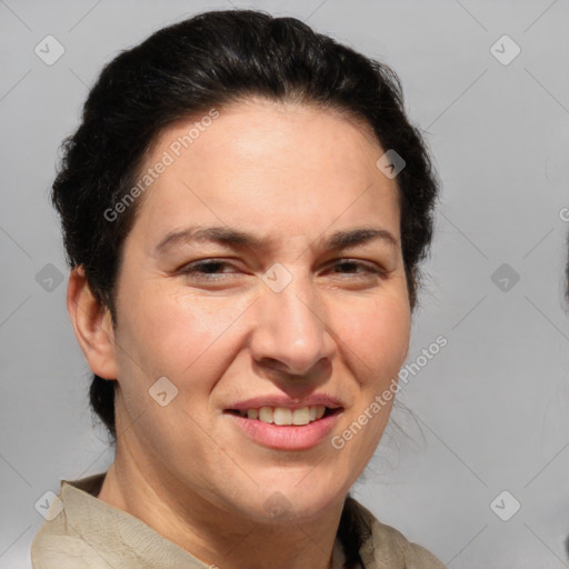 Joyful white adult female with short  brown hair and brown eyes