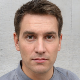 Neutral white adult male with short  brown hair and brown eyes