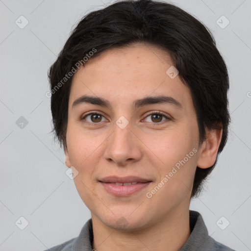 Joyful white young-adult female with short  brown hair and brown eyes