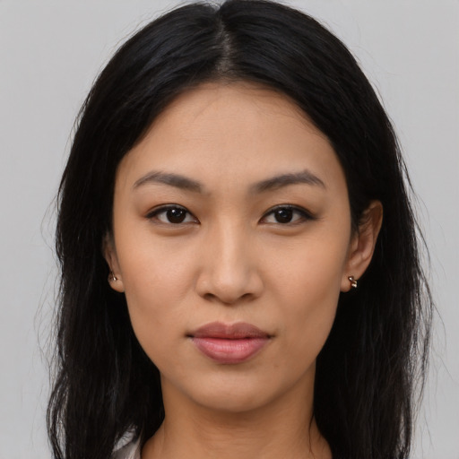 Neutral latino young-adult female with long  black hair and brown eyes