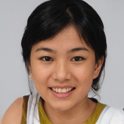 Joyful asian young-adult female with medium  black hair and brown eyes