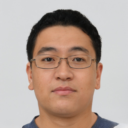 Neutral asian young-adult male with short  brown hair and brown eyes