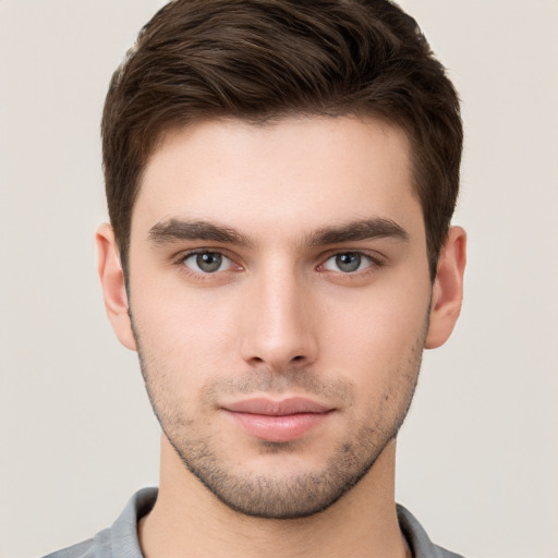 Neutral white young-adult male with short  brown hair and brown eyes