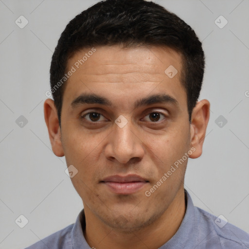 Joyful white young-adult male with short  black hair and brown eyes