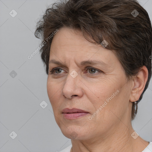 Joyful white adult female with short  brown hair and brown eyes