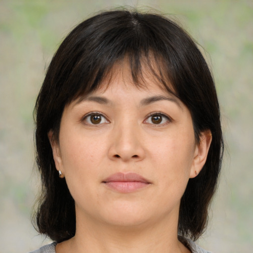 Neutral asian young-adult female with medium  brown hair and brown eyes