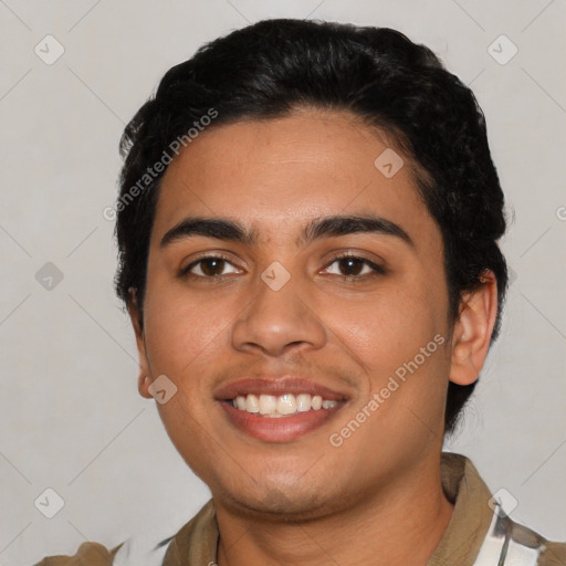 Joyful latino young-adult male with short  black hair and brown eyes