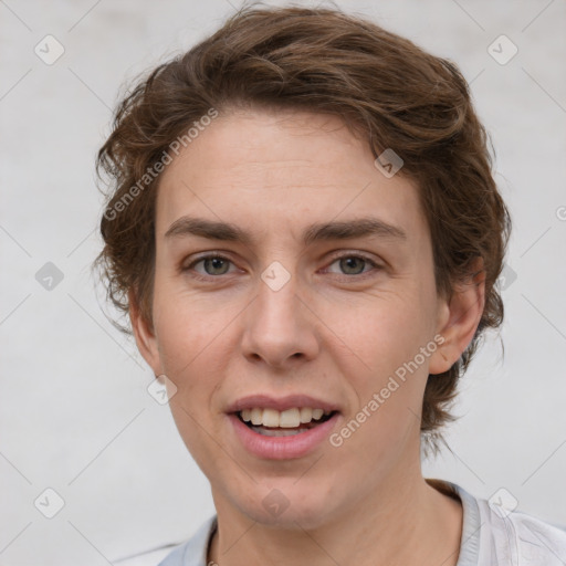 Joyful white adult female with short  brown hair and grey eyes