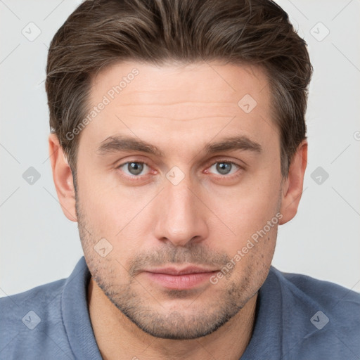 Neutral white young-adult male with short  brown hair and brown eyes