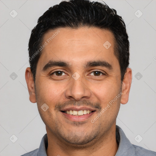 Joyful white young-adult male with short  black hair and brown eyes