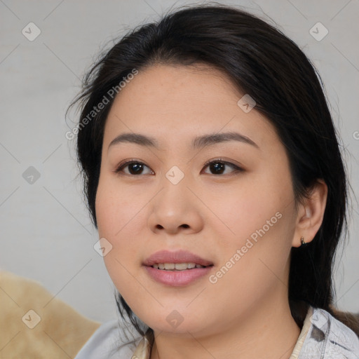 Joyful asian young-adult female with medium  black hair and brown eyes