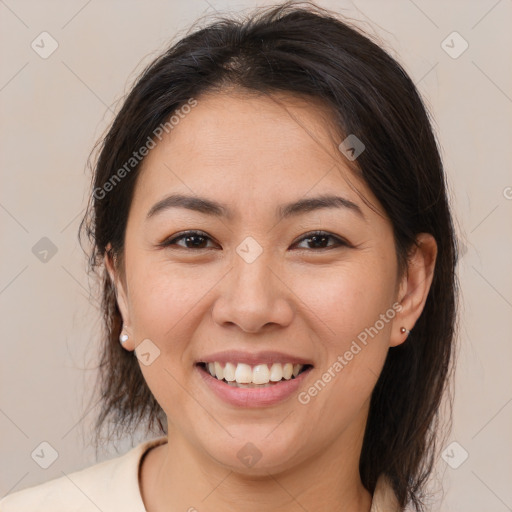 Joyful white young-adult female with medium  brown hair and brown eyes