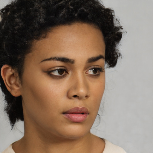 Neutral latino young-adult female with medium  brown hair and brown eyes