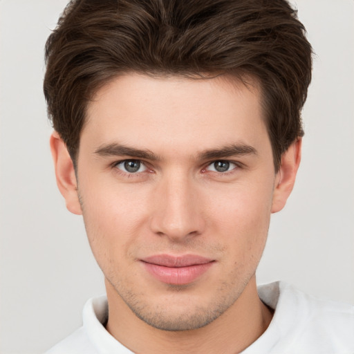 Neutral white young-adult male with short  brown hair and brown eyes