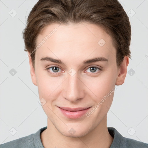 Joyful white young-adult female with short  brown hair and grey eyes