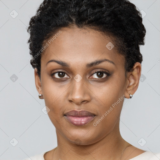 Neutral black young-adult female with short  brown hair and brown eyes