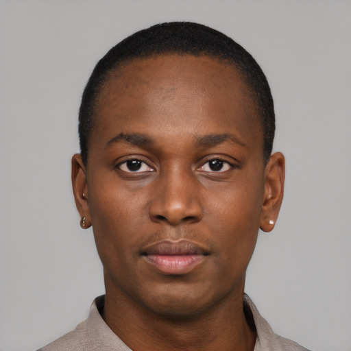 Neutral black young-adult male with short  brown hair and brown eyes