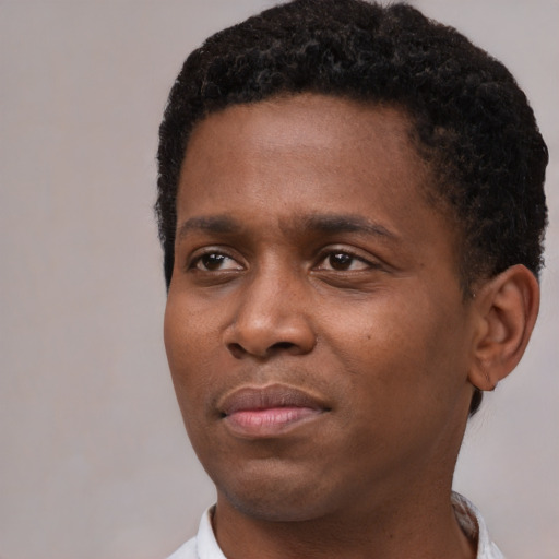 Neutral black young-adult male with short  brown hair and brown eyes