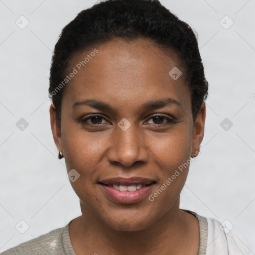 Joyful black young-adult female with short  brown hair and brown eyes