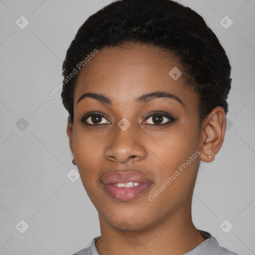 Joyful black young-adult female with short  black hair and brown eyes