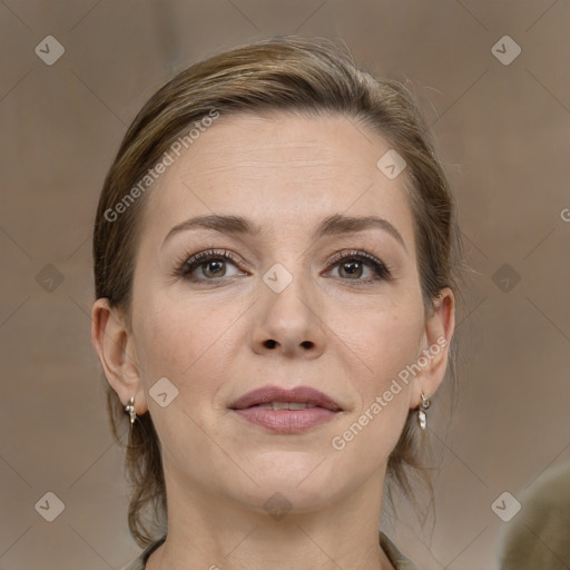 Joyful white adult female with medium  brown hair and grey eyes