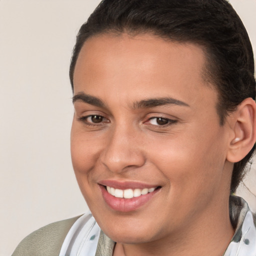 Joyful white young-adult female with short  brown hair and brown eyes