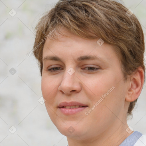 Joyful white young-adult female with short  brown hair and brown eyes