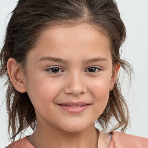 Joyful white child female with medium  brown hair and brown eyes