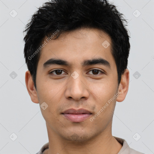 Joyful latino young-adult male with short  black hair and brown eyes