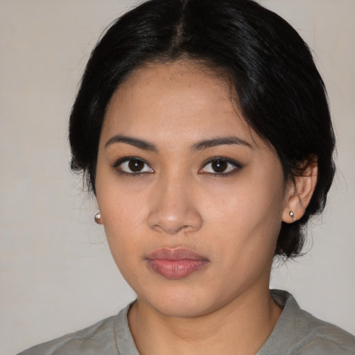Neutral asian young-adult female with medium  black hair and brown eyes