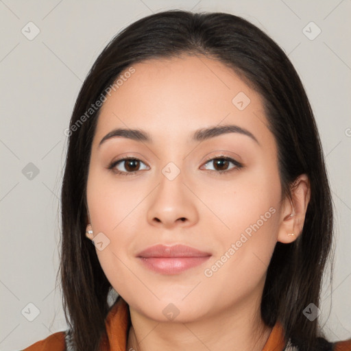 Joyful asian young-adult female with long  black hair and brown eyes